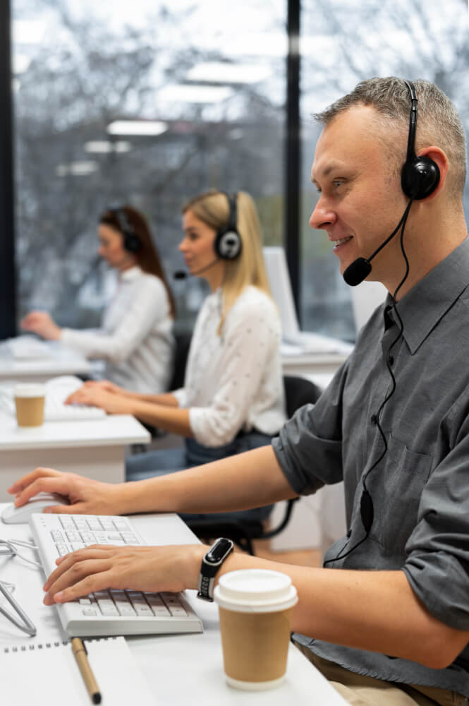 colleagues-working-together-call-center-office-with-coffee